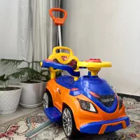 ماشین چهارچرخ دسته دار وموزیکال