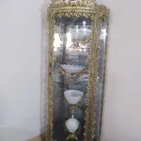 ساعت برنجی و بوفه برنجی