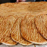 شاطر و خمیر گیر نان روغنی