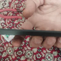 پوکوc65|موبایل|درمیان, |دیوار