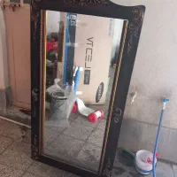 بوفه و آیینه و شمعدان