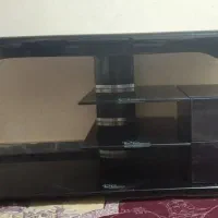 زیر تلویزیونی شیشه ای