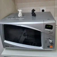 ماکروفر سولاردم کم استفاده شده دلونگی اصل باکارتن