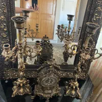 اینه و کنسول و دو عدد شمعدانی سلطنتی و ساعت شیک