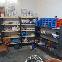 آموزشگاه و کارگاه عملی یخچال و لباسشویی  درب مغازه
