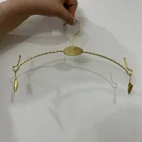 چوبکار لباس زیر طلایی