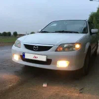 مزدا 323 مدل 2005 سالم رخ و زیر پا درجه 1