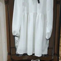 پیراهن مجلسی و کفش دخترانه.