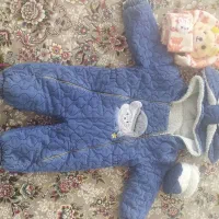 گهواره و کاپشن سرهمی نوزاد