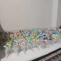 شلف فانتزی همراه گلدان و گلهای کاغذی زینتی