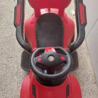 ماشین بچه گانه همراه با دسته
