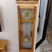 بوفه وساعت ایستاده ومیز تلویزیون