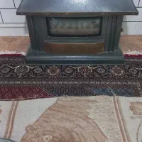 بخاری شومینه و یک عدد فرش۱۲متری و یک عدد اجاق گاز