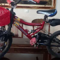 دوچرخه سایز ۱۶ در حد نو کم کار  کمکدار تمام فابریک