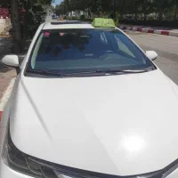 سفر با ماشین تویوتا کرولا هیبرید با راننده