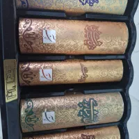 چندین جلد کتاب شعر کاملانو . کاغذ کلاسه .