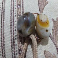 مهره قدیمی هزارساله تماس