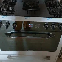 اجاق گاز چرخ گوشت آبمیوه گیری قابلمه ت