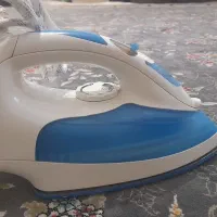 اتو سنگی قدیمی و اتو بخار