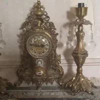 ساعت وشمعدان برنزی
