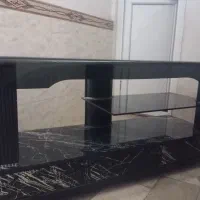 میز تلویزیون شیشه‌ای سه کشوئی