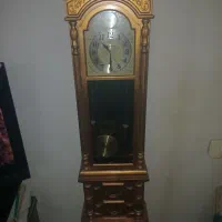 ساعت قدی وصندلی تاشو