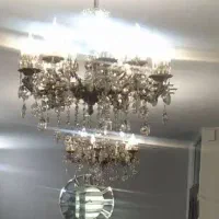 قالیچه.لوستر.صندلی