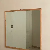 آینه دیواری با فریم چوبی