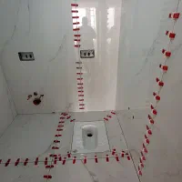 کاشی کار  و سنگ کار  و کاشی چسپی اسلب و موزاییک کف
