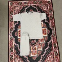 شلوارک|لباس|کرج, باغ سیب|دیوار
