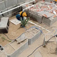 کارگر و لوله کش و بنا