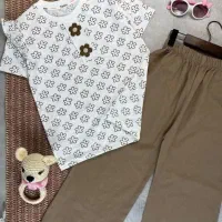 تیشرت شلوار ست دخترانه سفید طرح گل برجسته