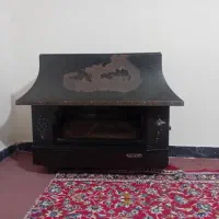 بخاری گازی طرح شومینه