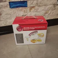 شیردوش برقی خانگی