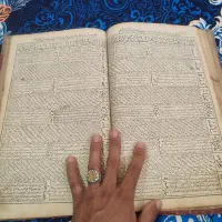 قرآن ، و کتاب استخاره ، طبیعی، لباس