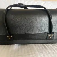 کیف چرم مشکی ناخن و مژه ارایشگری