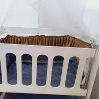 گهواره کنار مادر