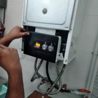 تعمیرات و نصب انواع پکیج و آبگرمکن و کولر آبی