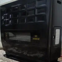 بخاری گازی .آینه و کنسول و شمعدان.کابینت