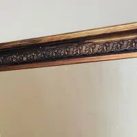 آیینه شیشه ترک قاب چوب