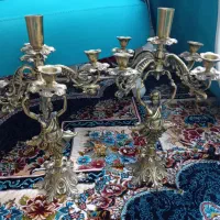 دوعدد شمعدون قدیمی سنگین وزن. برنجی