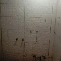 کارگر برا کاشیکاری میخام