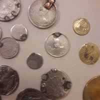 فروش تعدادی سکه از نقره و غیره
