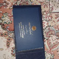 البوم اسکناس بانک مرکزی و 100عدد سکه