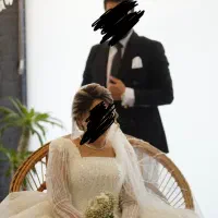 لباس عروس پوشیده سنگدوزی‌