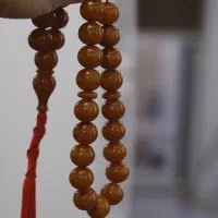 تسبیح کهربا کاراملی