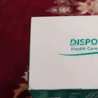 دستکش وینیل و رول ملحفه