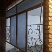 پنجره آهنی سنگین باشیشه