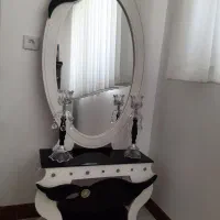 آیینه و شمعدان و کنسول