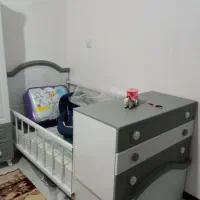 تخت خواب نوزاد کودک جوان